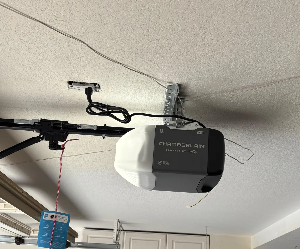 Chamberlain garage door opener mounted during a southwest Denver metro service job in June 2025.