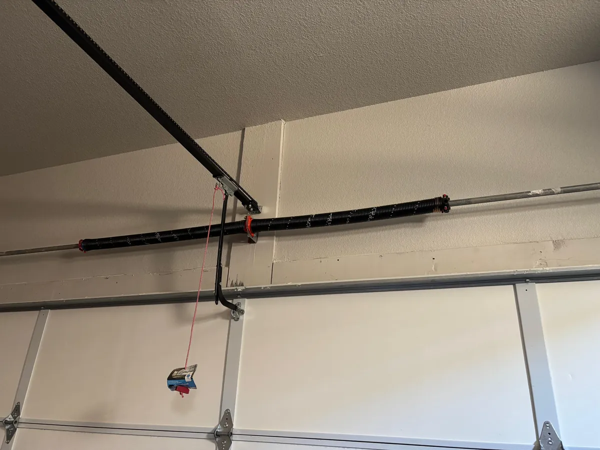 Completed torsion spring replacement on the same Morrison garage door in December 2024.
