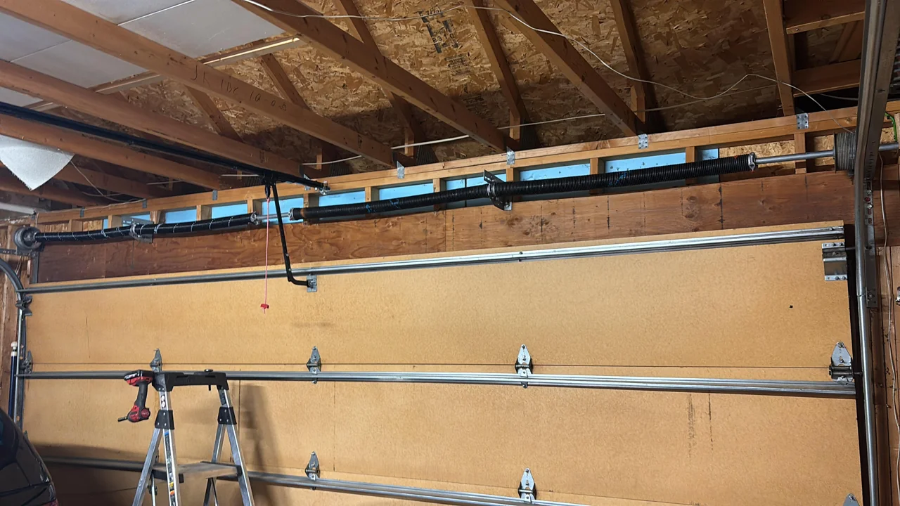 Upgraded garage door torsion spring system at a Boulder home